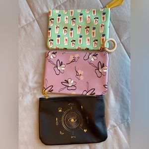 3 brand new Ipsy zipper pouches.